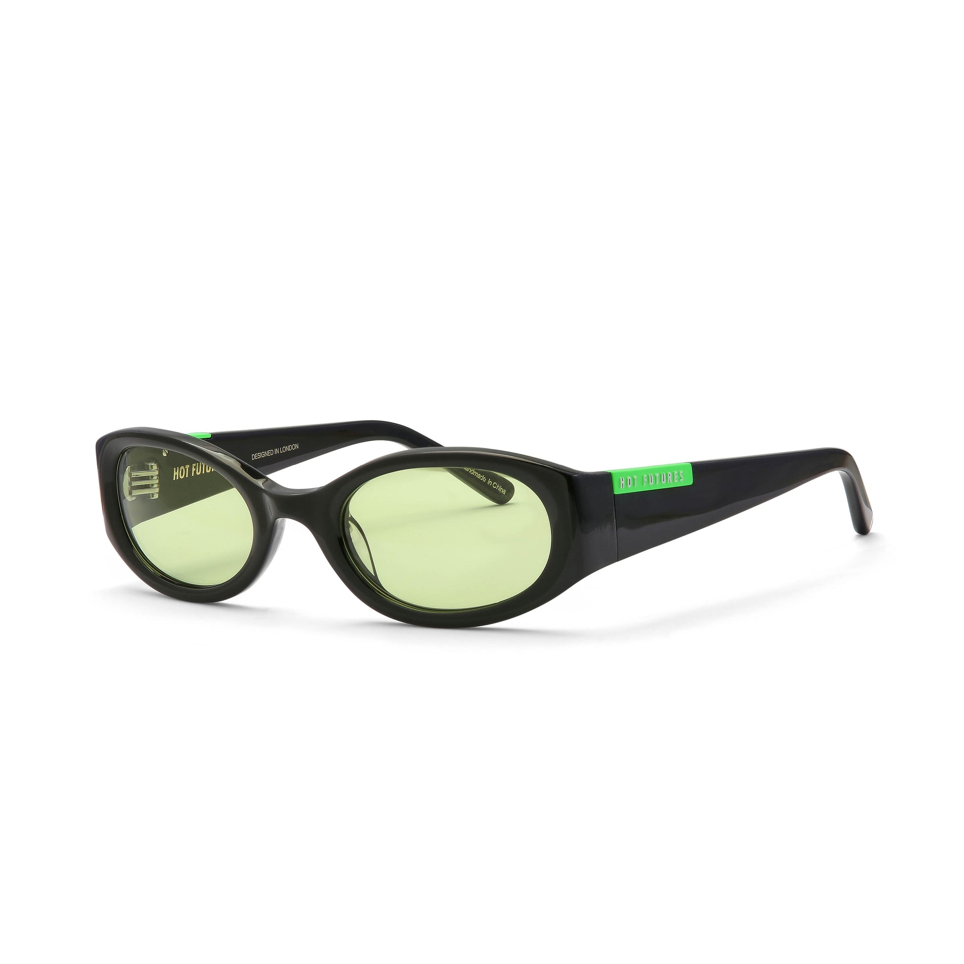 Side angle shot of the Hot Future Baby Racer gloss black/green frame sunglasses taken against a white background