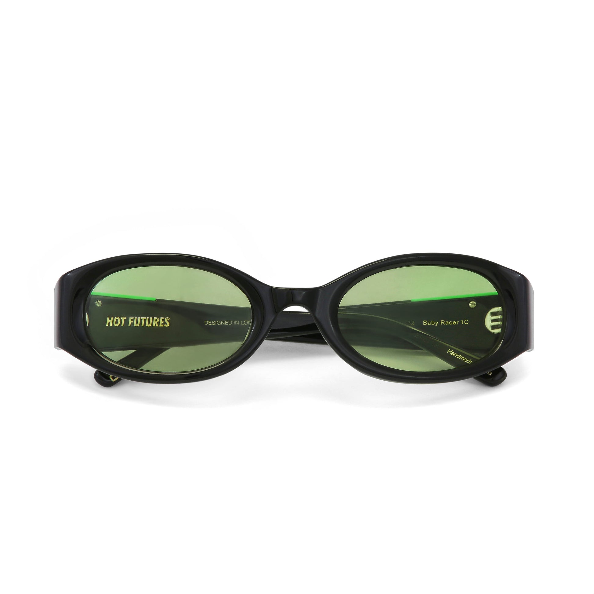 front facing flat laid image of the black glossy sunglasses with green lenses
