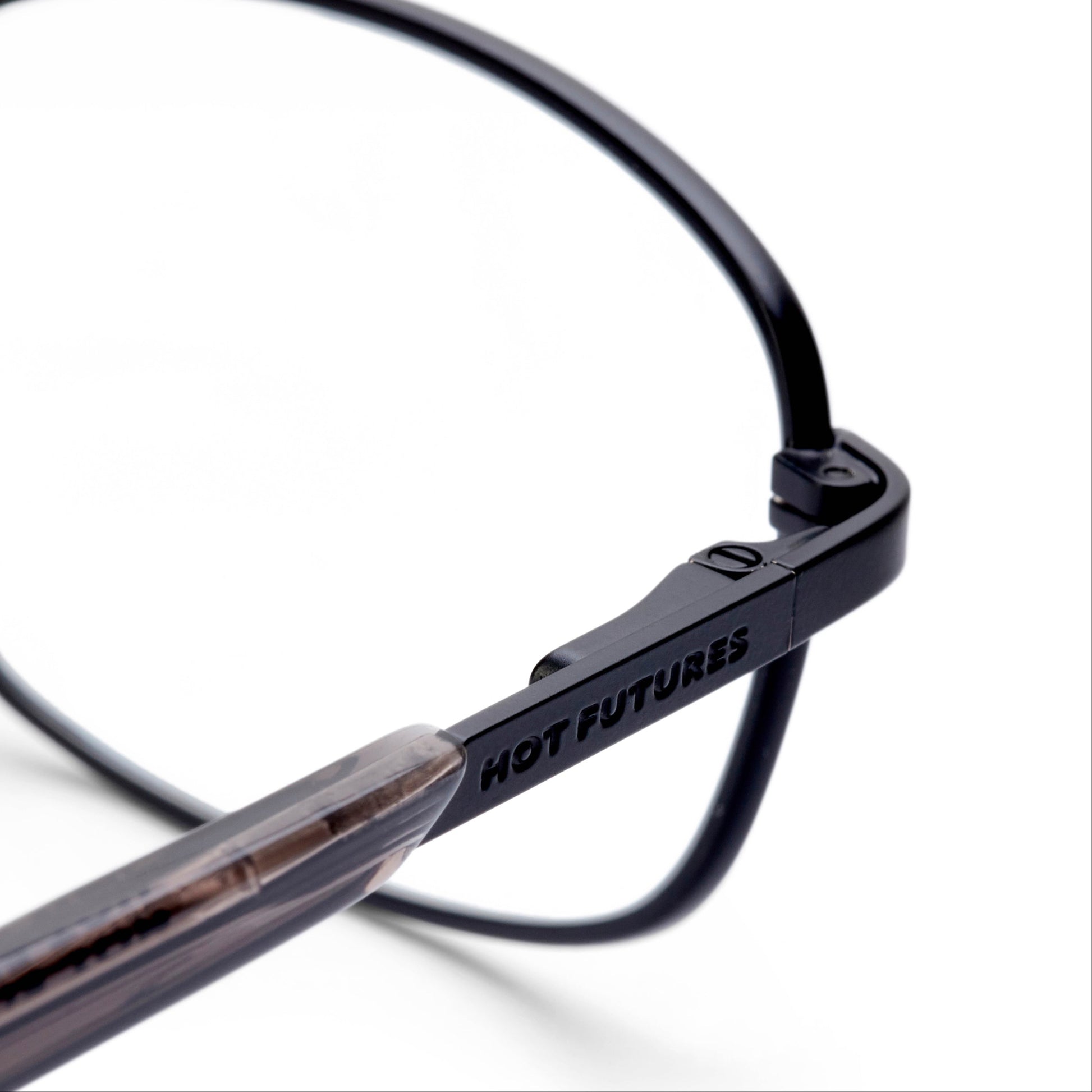 close up of the Blaze prescription glasses showing the Hot Futures branding on the arm against a white background