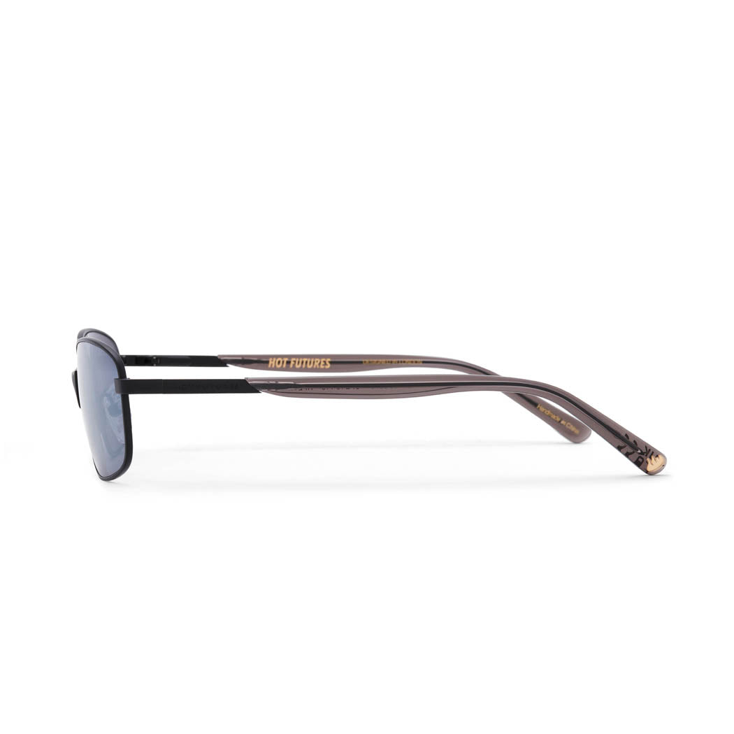 Side angle shot of the blaze sunglasses in matt black frame, the arms have the hot futures logo on them and a gold flame at the end of the arm.