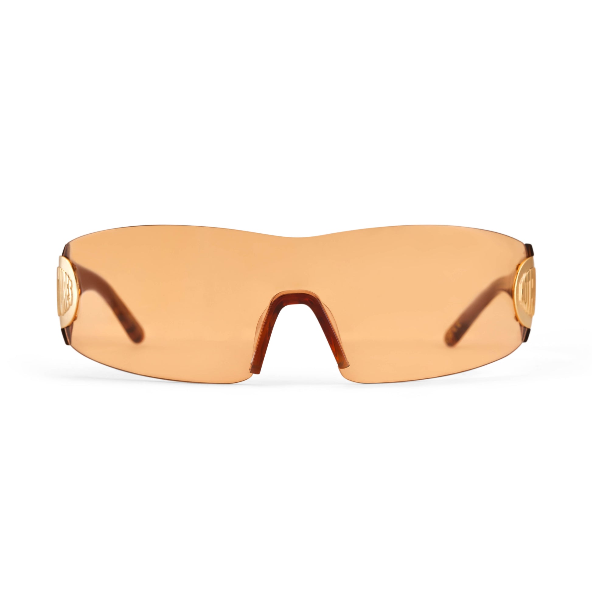 A pair of polka amber acetate frame sunglasses with amber tinted lenses and a gold logo