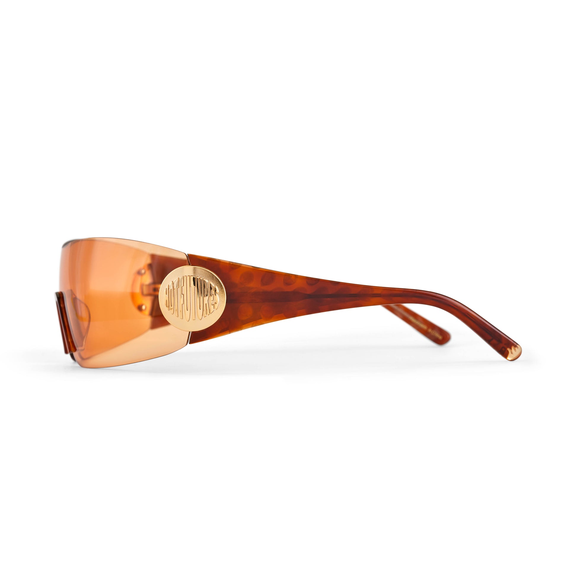 side shot of the club kid sunglasses in amber against a white background