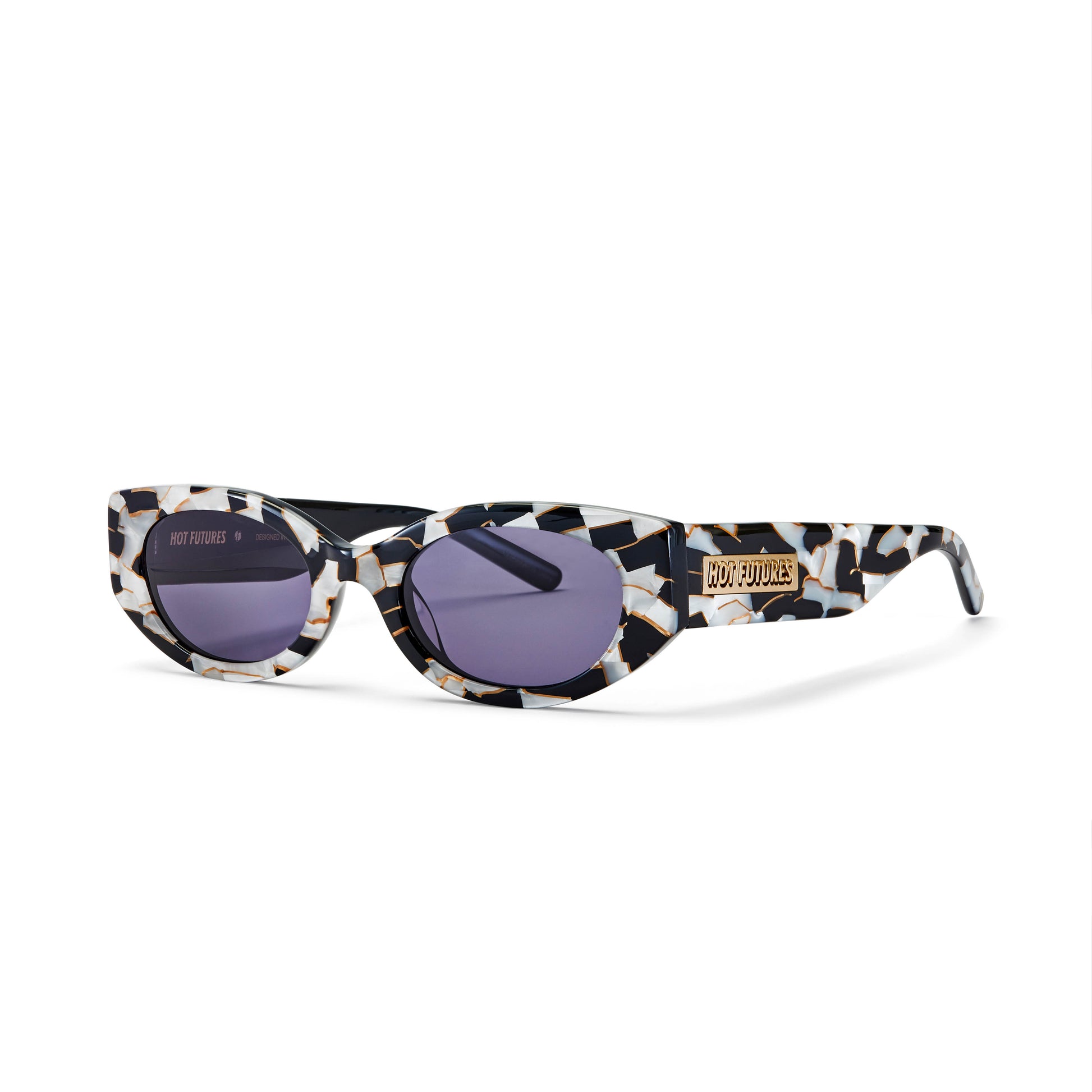The Cosmic Rebel Sunglasses with a black & white mosaic frame and dark smokey lenses.