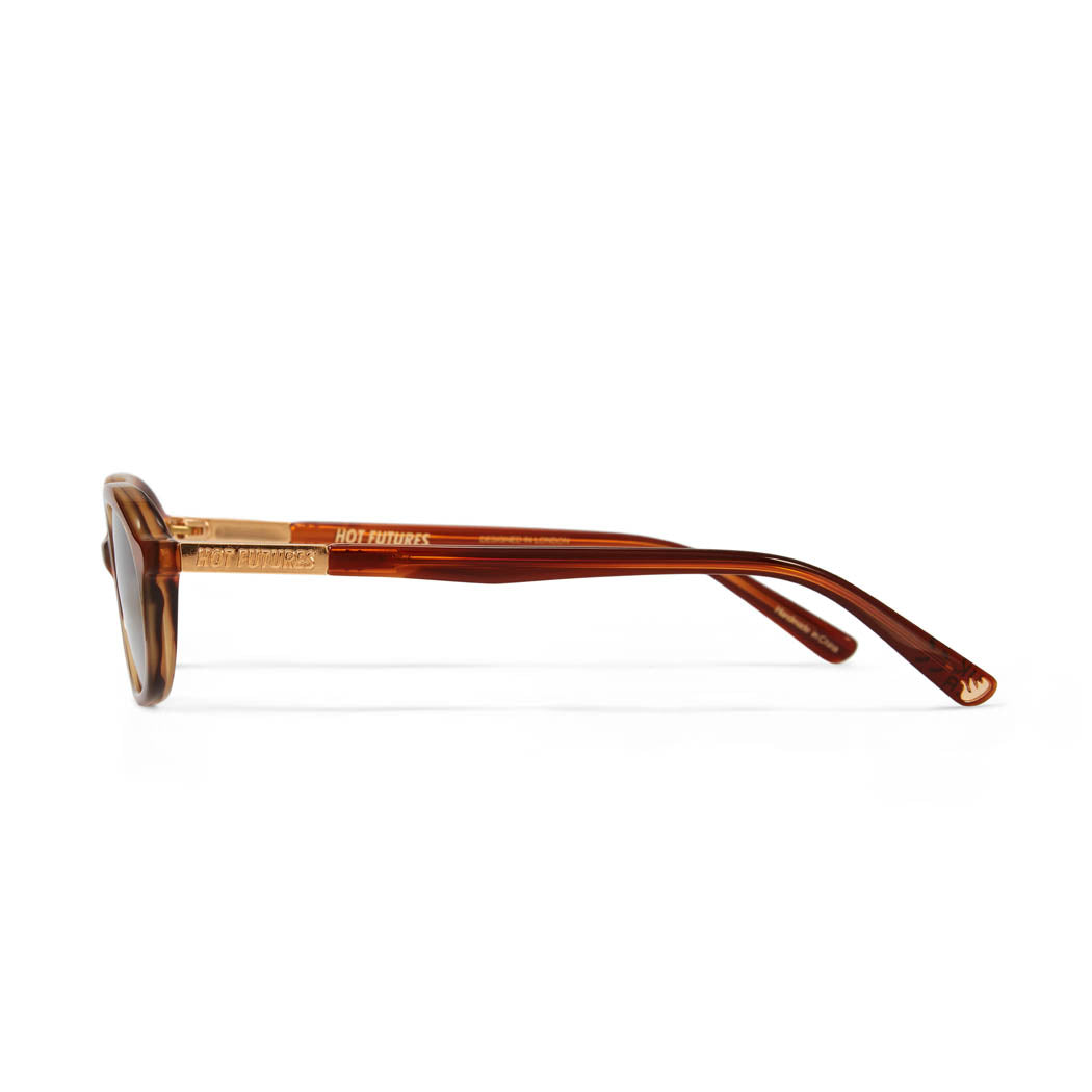 side shot of the Cupid caramel tortoiseshell sunglasses, with the gold Hot Futures branded text logo shown on the arms