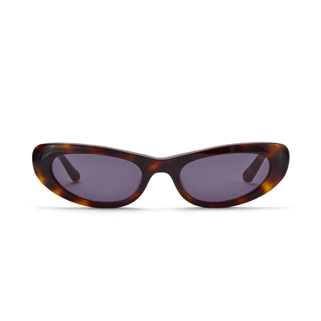 Sunglasses with tortoiseshell frame and dark lenses on a white background