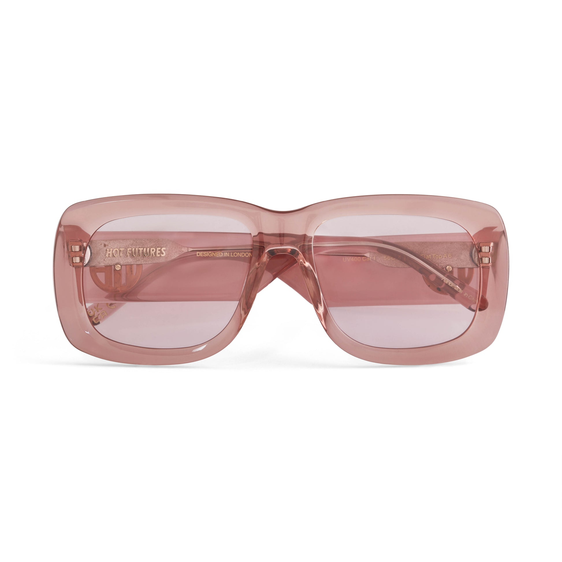 A pair of rose pink acetate flat top large sunglasses with pink tinted lenses, with the gold Hot Futures branding shown on the arms