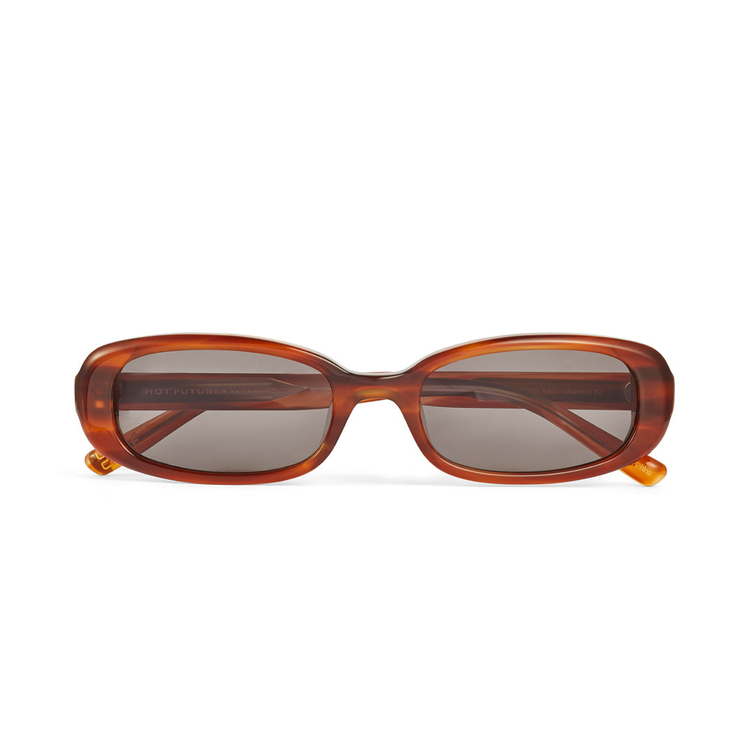 Hot Futures Eco Caramel Dark Green Sunglasses shot from the front showing their darker lens laid flat