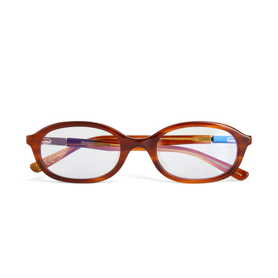 A pair of eyeglasses with a caramel frame and clear lenses.