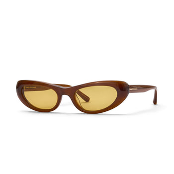 Brown sunglasses with yellow lenses on a white background