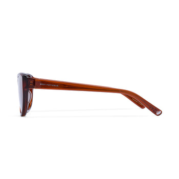 Sunglasses with a brown frame and clear lenses on a white background