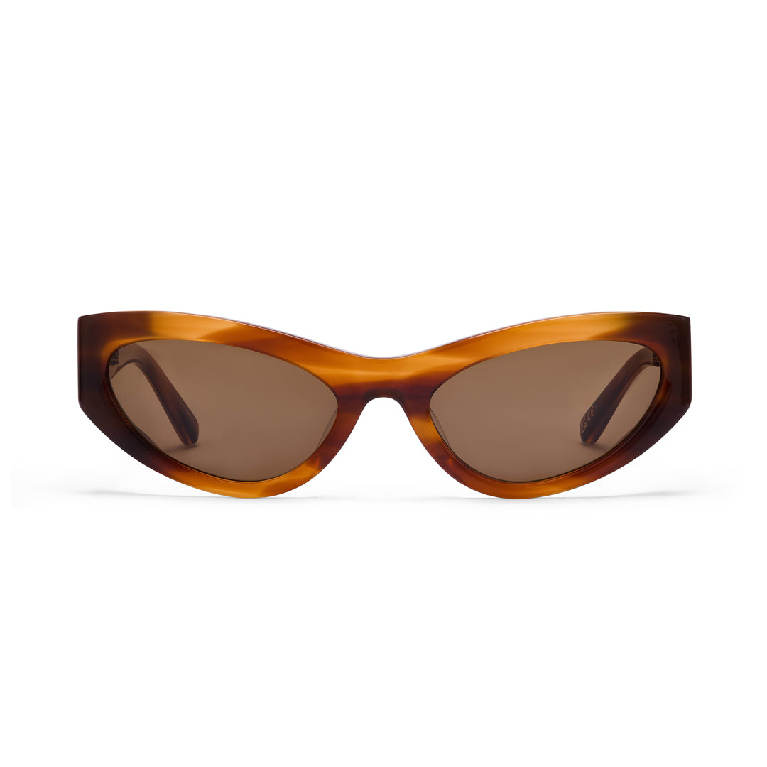 Hot Futures Storm cat eye shaped caramel brown sunglasses with brown lenses on a white backdrop